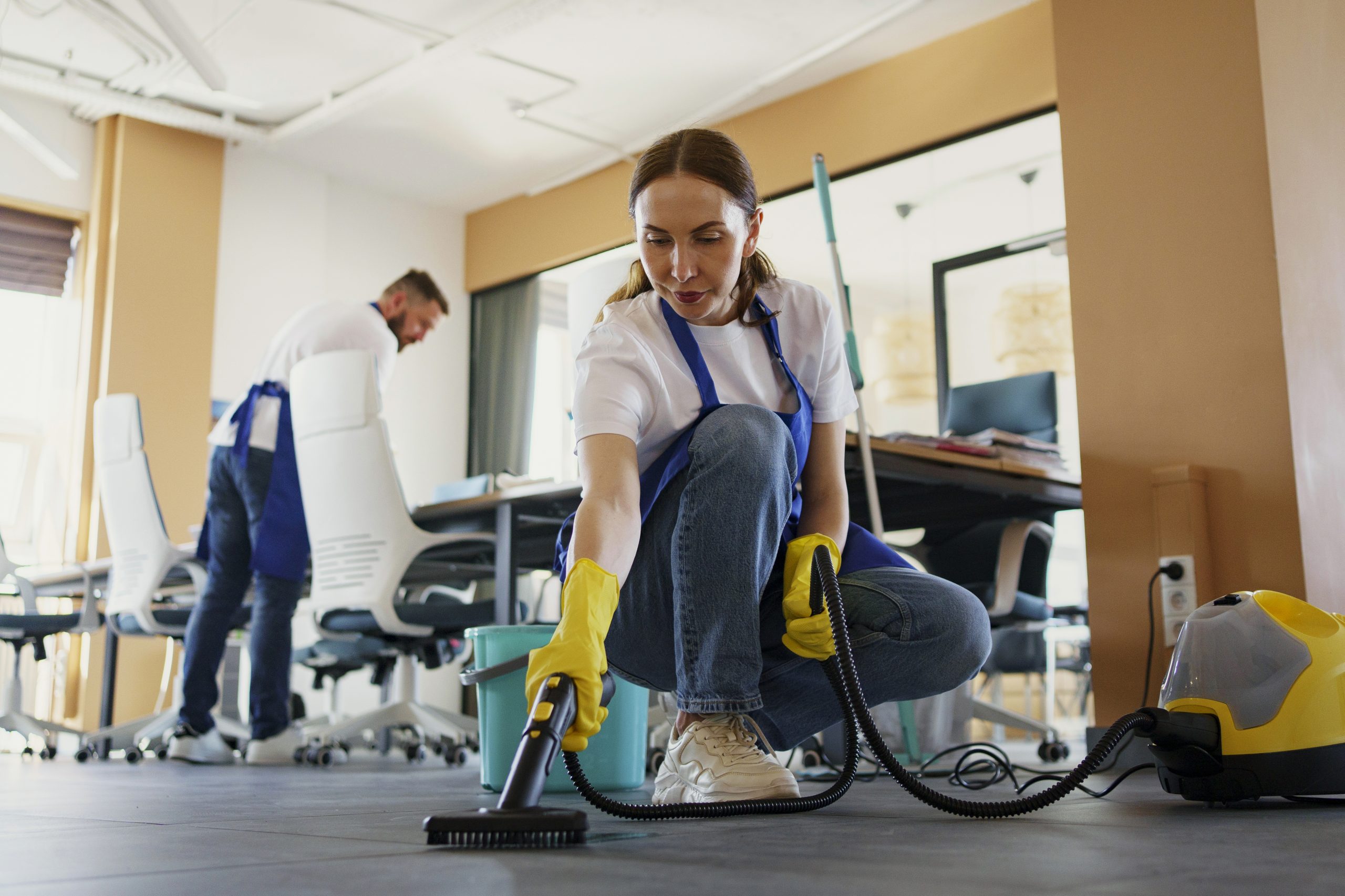 professional-cleaning-service-person-using-vacuum-cleaner-office deep cleaning
