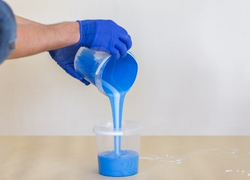 front-view-hands-blue-paint Sealed for Strength